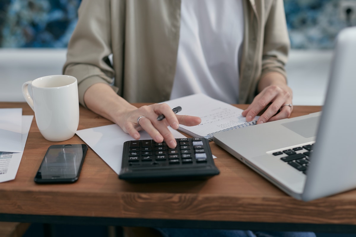 woman-calculator-laptop